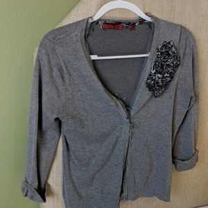 Grey sweater with flower detail